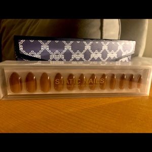 Static reusable manicure nails.